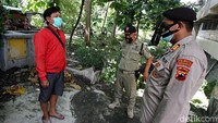Sanksi menanti warga yang terjaring razia masker di kawasan Solo.