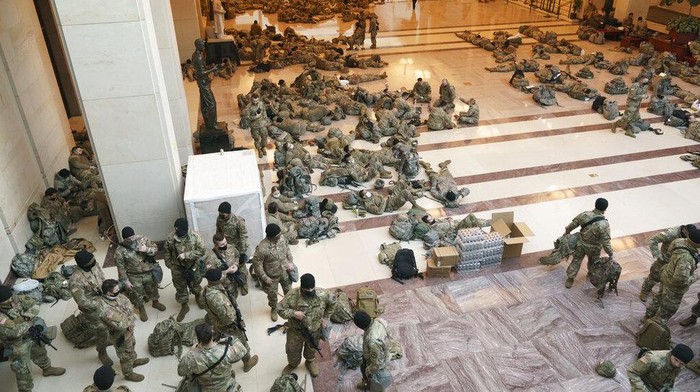 Hundreds of National Guard troops hold inside the Capitol Visitors Center to reinforce security at the Capitol on Wednesday, Jan. 13, 2021, in Washington, D.C.(J. SCOTT APPLEWHITE/AP)