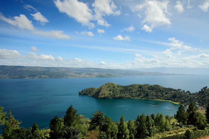 Tanjung Unta in Lake Toba with Samosir Island on the background