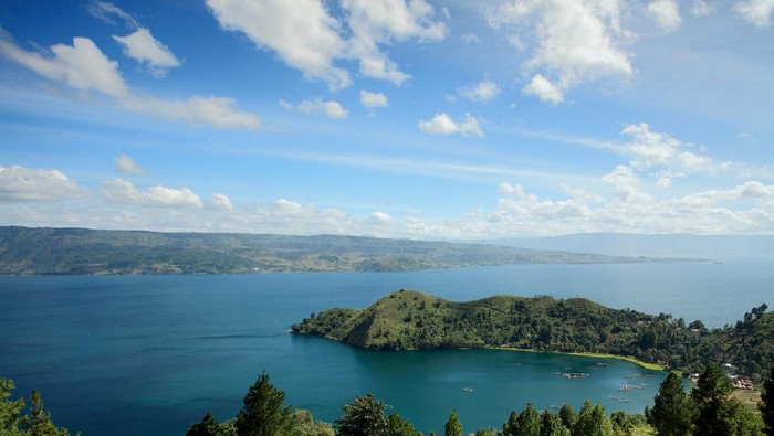 Tanjung Unta in Lake Toba with Samosir Island on the background