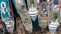 Lima kapal pesiar mewah terlihat sedang dipecah menjadi besi tua di pelabuhan daur ulang kapal Aliaga di Izmir, Turki. Getty Images/Chris McGrath  