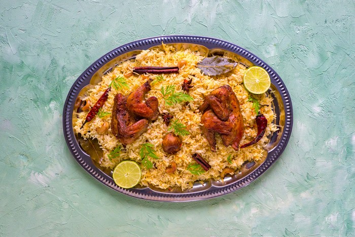 Mandi Kabsa, Yemenis style. Festive dish with baked chicken and rice.
