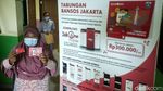 Bukan Ambil Rapot, Warga Ini Datang ke Sekolah Jemput Bansos Tunai