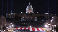 Alhasil, pelantikan Joe Biden dan wakilnya, Kamala Harris, akan tetap dilangsungkan di Gedung Capitol tanpa kehadiran warga Amerika. Sementara pestanya diubah menjadi event virtual dengan menampilkan sederet selebritas. AP Photo/Alex Brandon  