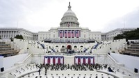 Fakta terakhir adalah banyaknya selebritas, terutama penyanyi, yang diundah untuk memeriahkan pesta pasca pelantikan Joe Biden-Kamala Harris. AP Photo/Patrick Semansky  