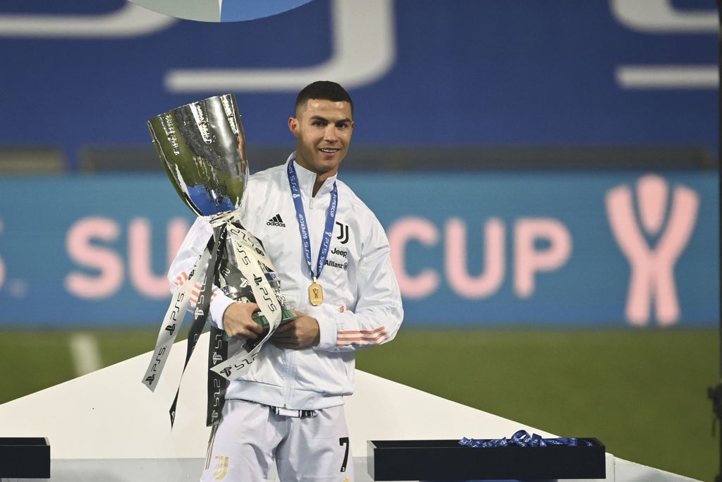 Juventus' Cristiano Ronaldo celebrates following the Italian Super Cup final soccer match between Juventus and Napoli at the Mapei stadium in Reggio Emilia, Italy, Wednesday, Jan. 20, 2021. Juventus won the match 2-0. (Massimo Paolone/LaPresse via AP)