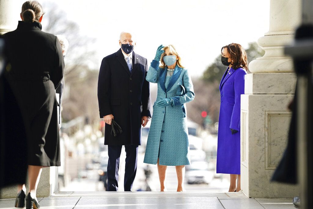 President-elect Joe Biden and his wife Jill Biden arrive at the East Front of the U.S. Capitol ahead of Biden's inauguration, Wednesday, Jan. 20, 2021, at the U.S. Capitol in Washington. ((Jim Lo Scalzo/Pool Photo via AP)