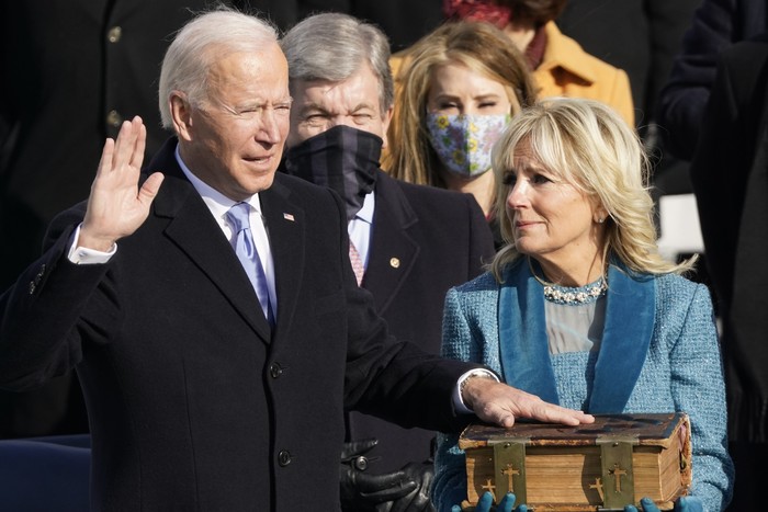 President-elect Joe Biden and his wife Jill Biden arrive at the East Front of the U.S. Capitol ahead of Biden’s inauguration, Wednesday, Jan. 20, 2021, at the U.S. Capitol in Washington. ((Jim Lo Scalzo/Pool Photo via AP)