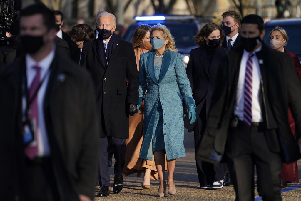 President-elect Joe Biden and his wife Jill Biden arrive at the East Front of the U.S. Capitol ahead of Biden's inauguration, Wednesday, Jan. 20, 2021, at the U.S. Capitol in Washington. ((Jim Lo Scalzo/Pool Photo via AP)