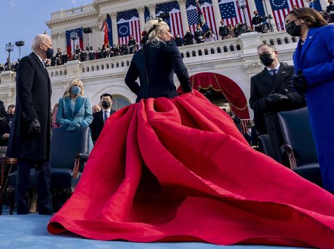 Lady Gaga performs the National Anthem as President-elect Joe Biden applauds during the 59th Presidential Inauguration at the U.S. Capitol in Washington, Wednesday, Jan. 20, 2021. (AP Photo/Andrew Harnik)