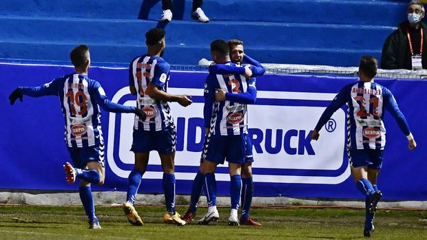 Spain Soccer Copa del Rey Alcoyano's Jose Solbes, centre celebrates with team mates after scoring the equaliser, his side's first goal during a Spanish Copa del Rey round of 32 soccer match between Alcoyano and Real Madrid at the El Collao stadium in Alcoy, Spain, Wednesday Jan. 20, 2021. (AP Photo/Jose Breton)
