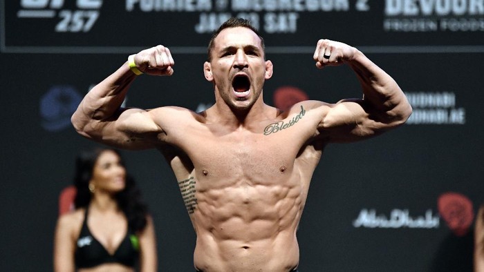 ABU DHABI, UNITED ARAB EMIRATES - JANUARY 22:  In this handout image provided by the UFC, Michael Chandler poses on the scale during the UFC 257 weigh-in at Etihad Arena on UFC Fight Island on January 22, 2021 in Abu Dhabi, United Arab Emirates. (Photo by Jeff Bottari/Zuffa LLC via Getty Images)