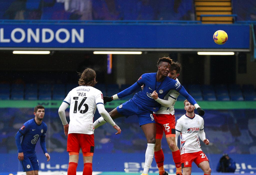 Tammy Abraham Chelsea's Tammy Abraham, third left, scores his side's second goal during the English FA Cup fourth round soccer match between Chelsea and Luton Town at Stamford Bridge Stadium in London, Sunday, Jan. 24, 2021. (AP Photo/Ian Walton)