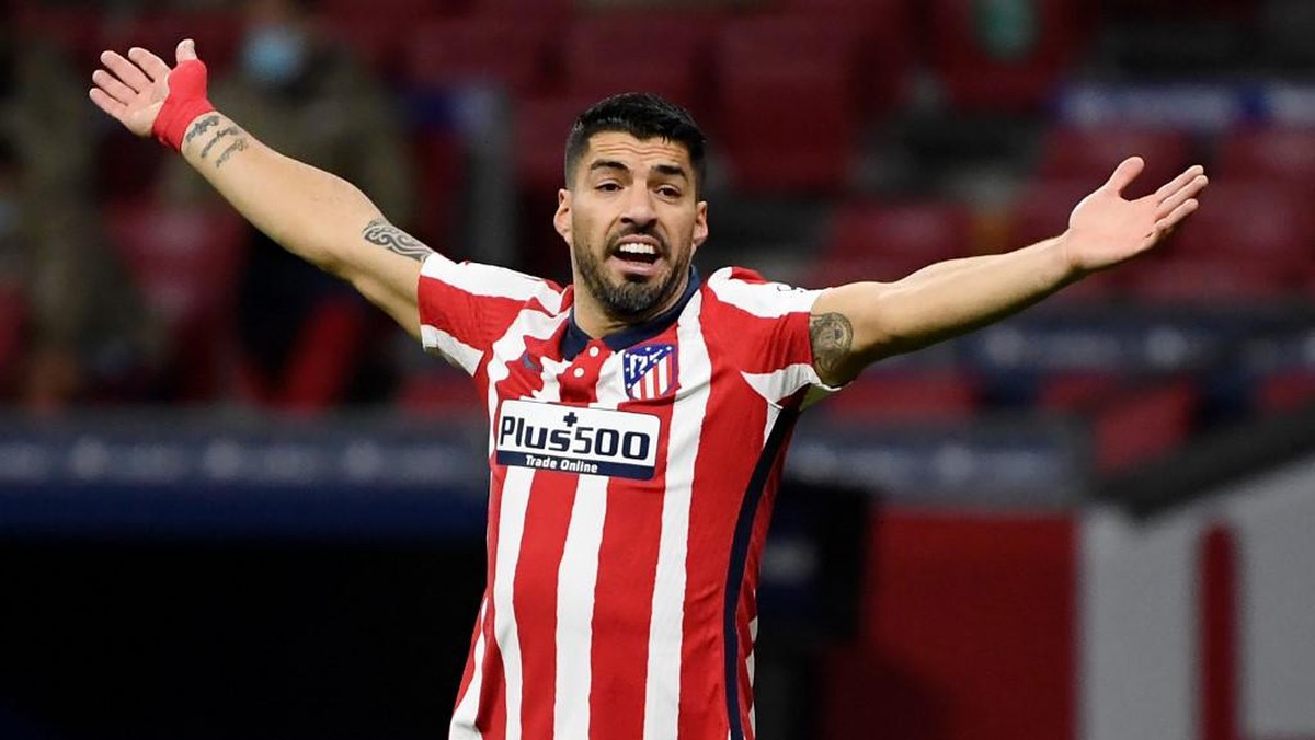 Striker Atletico Madrid Luis Suarez memuncaki daftar top skor Liga Spanyol dengan 12 gol ( Foto: AFP/PIERRE-PHILIPPE MARCOU)