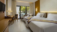 Kamar deluxe yang terakhir adalah Deluxe Pool Side yang punya akses langsung ke kolam dan pantai. (Grand Inna Kuta)