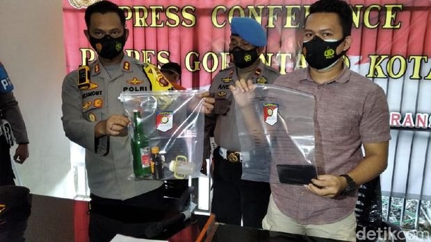 Polres Gorontalo Kota merilis kasus 4 tersangka mencekoki bayi dengan miras.