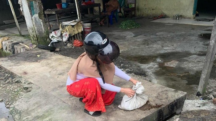 Screenshot posting-an viral wanita temukan goni isi kepala kucing di Medan (dok. Istimewa)
