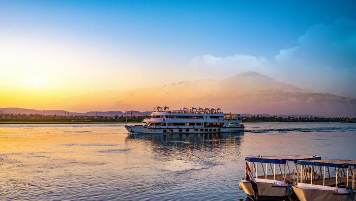 River Nile and ship at sunset in Aswan