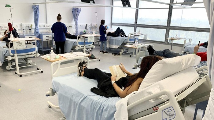 A dose of the Phase 3 Novavax coronavirus vaccine is seen ready for use in the trial at St. Georges University hospital in London Wednesday, Oct. 7, 2020. Novavax Inc. said Thursday Jan. 28, 2021 that its COVID-19 vaccine appears 89% effective based on early findings from a British study and that it also seems to work — though not as well — against new mutated strains of the virus circulating in that country and South Africa. (AP Photo/Alastair Grant)