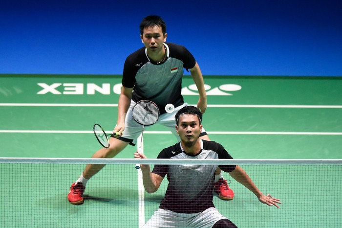 CHOFU, JAPAN - JULY 28: Mohammad Ahsan and Hendra Setiawan of Indonesia compete in the Mens Doubles Final match against Marcus Fernaldi Gideon and Kevin Sanjaya Sukamuljo of Indonesia on day six of the Daihatsu Yonex Japan Open Badminton Championships, Tokyo 2020 Olympic Games test event at Musashino Forest Sport Plaza on July 28, 2019 in Chofu, Tokyo, Japan. (Photo by Matt Roberts/Getty Images)