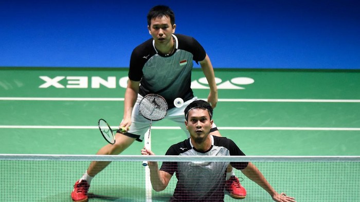 CHOFU, JAPAN - JULY 28: Mohammad Ahsan and Hendra Setiawan of Indonesia compete in the Mens Doubles Final match against Marcus Fernaldi Gideon and Kevin Sanjaya Sukamuljo of Indonesia on day six of the Daihatsu Yonex Japan Open Badminton Championships, Tokyo 2020 Olympic Games test event at Musashino Forest Sport Plaza on July 28, 2019 in Chofu, Tokyo, Japan. (Photo by Matt Roberts/Getty Images)