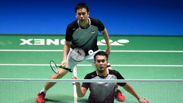 CHOFU, JAPAN - JULY 28: Mohammad Ahsan and Hendra Setiawan of Indonesia compete in the Men's Doubles Final match against Marcus Fernaldi Gideon and Kevin Sanjaya Sukamuljo of Indonesia on day six of the Daihatsu Yonex Japan Open Badminton Championships, Tokyo 2020 Olympic Games test event at Musashino Forest Sport Plaza on July 28, 2019 in Chofu, Tokyo, Japan. (Photo by Matt Roberts/Getty Images)