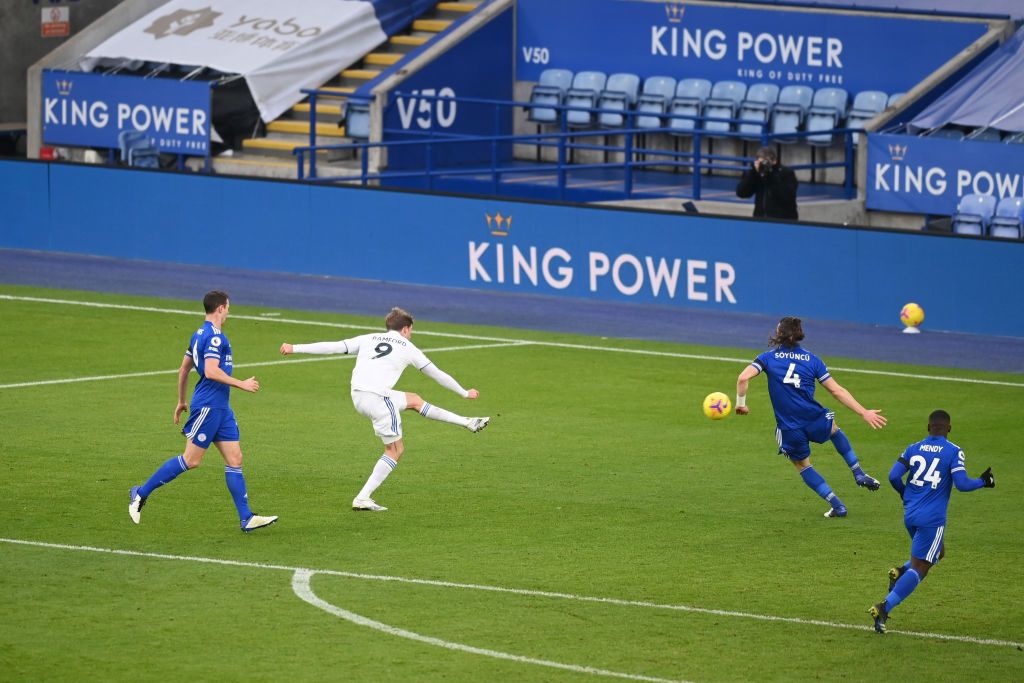 LEICESTER, ENGLAND - JANUARY 31: Patrick Bamford of Leeds United is challenged by Namplayas Mendy of Leicester City during the Premier League match between Leicester City and Leeds United at The King Power Stadium on January 31, 2021 in Leicester, England. Sporting stadiums around the UK remain under strict restrictions due to the Coronavirus Pandemic as Government social distancing laws prohibit fans inside venues resulting in games being played behind closed doors. (Photo by Michael Regan/Getty Images)