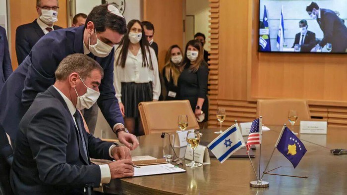 Israeli Foreign Minister Gabi Ashkenazi (L) signed a joint declaration establishing diplomatic ties with Kosovo during a ceremony held over Zoom with his counterpart from Kosovo, Meliza Haradinaj-Stublla, at Israels foreign ministry in Jerusalem menahem kahana AFP