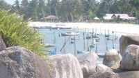Pantai Tanjung Kelayang mempunyai pasir putih bersih.jpg