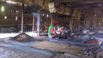 Noken dan Rumah Bujang Suku Asmat