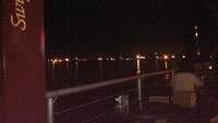 Rentetan sinar lampu dari Singapura terlihat jelas dari Harbour bay