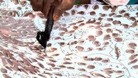 Proses pembuatan dasar motif batik tulis
