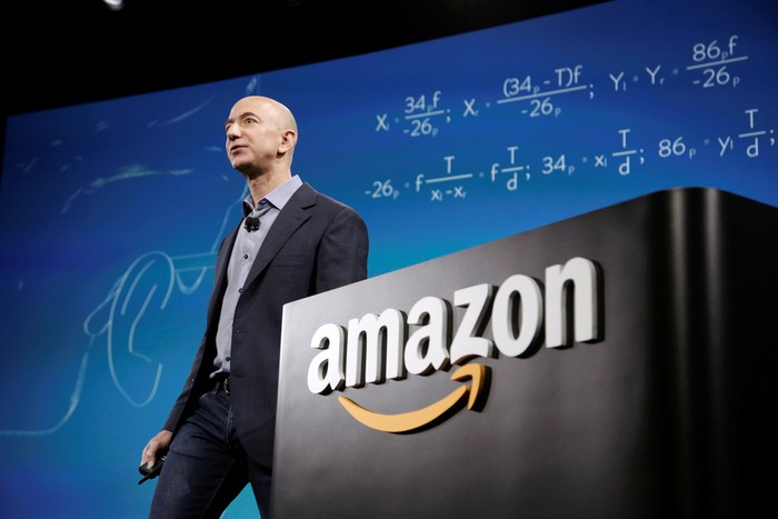 FILE PHOTO: Amazon CEO Jeff Bezos discusses his companys new Fire smartphone at a news conference in Seattle, Washington, U.S., June 18, 2014.   REUTERS/Jason Redmond/File Photo