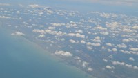 Tumpukan awan di bibir pantai pulau Sumatera