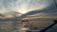 Matahari terbit di perjalanan menuju Teluk Biru