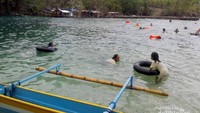 Ber-snorkling ria di Pantai Sulamadaha