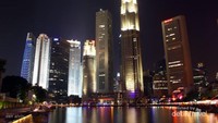 Pemandangan gedung pencakar langit dari tepi Singapore river