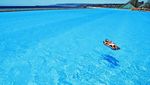 Byur! Serunya Berenang di Kolam Renang Terbesar di Dunia