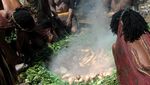 Di Kampung Obia, Ubi Dimasak Menggunakan Batu Panas