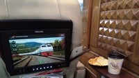 Selama perjalanan, penumpang bisa menikmati hiburan yang tersedia melalui layar TV dengan ragam pilihan