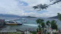 Paduan arakah awan putih menyempurnakan keindahan yang bisa kita nikmati dari Pulau Hon Mun.