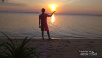 Traveler yang mengabadikan momen