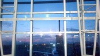 Sunrise dari ruang tungu Bandara Sultan Hasanuddin Makassar