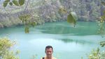 Mitos Buaya Putih & Budaya Lempar Batu di Danau Tolire, Ternate