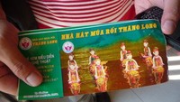 Tiket pertunjukan wajang air