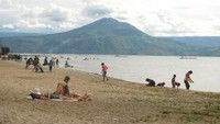 Wisawatan yang melancong ke Danau Toba