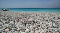 Batu aneka warna di Pantai Kolbano