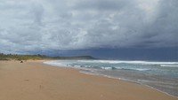 Pantai dengan pasir merah