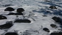 Salah satu fungsi batu batu ini adalah menahan tekanan ombak. Karena ombak di pantai ini sangat kencang.