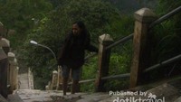 Menaiki tangga untuk mencapai puncak Suroloyo